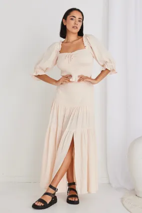 Sure, heres an optimized title with modifiers for the e-commerce product:

Chic Alive Cream Tiered Maxi Skirt with Elastic Back in Soft Muslin

This title highlights the style, color, and key features of the skirt.